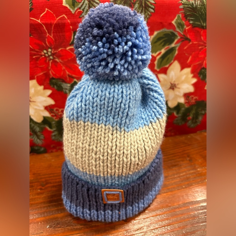 Hand-knitted warm light blue baby hat